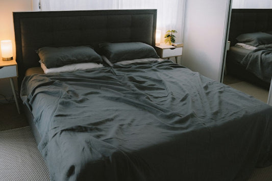 Tala grounding sheet fitted to a bed, showing how to choose the right size